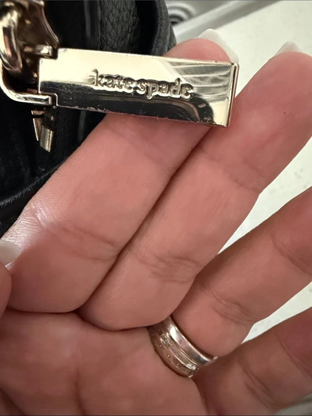 kate spade Black Pebbled Leather Mini Backpack with Gold Hardware
